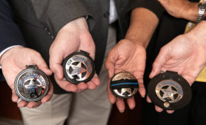 NOPD Chaplains Holding Badges