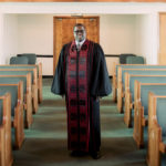 Pastor Sanders in his church